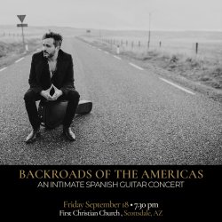 Black-and-white promotional image of Spanish guitarist Diego García seated on his guitar case in the middle of an empty rural road.