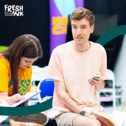 Tom Wells, a white man, leading a writing workshop at Fresh Ink 2025.