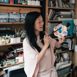 Our artist Ping He explaining her color choices