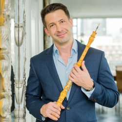 Oboist Daniel Bates with oboe