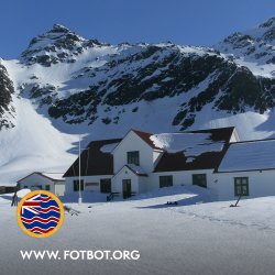 A view over looking south georgia settlement with snowy mountains in the background