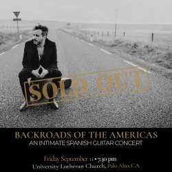Black-and-white promotional image of Spanish guitarist Diego García seated on his guitar case in the middle of an empty rural road.