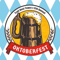 A cartoon stein of beer in a circle with hop leaves. It reads Trail Dust Town's 12th Annual Oktoberfest with Oktoberfest in a red banner. The background is blue and white diamonds