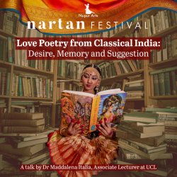 A Bharatanatyam dancer reading a book in a library