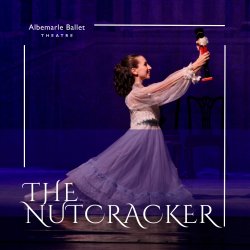 Clara holding the Nutcracker