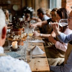 People sitting at a table eating together