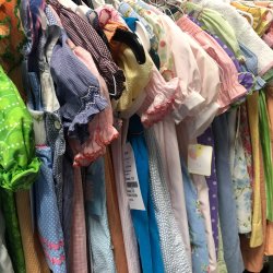 side view of lots of smocked clothing