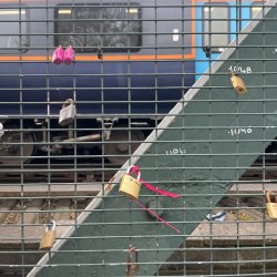 Lovelocks on a railway bridge