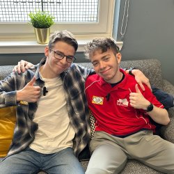 Young people giving the thumbs up