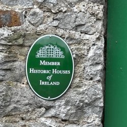 Image of Historic Houses of Ireland Member Plaque affixed to the wall beside front door of Thornfield House in Co. Limerick