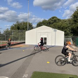 Beginner cyclists learning to ride a bike