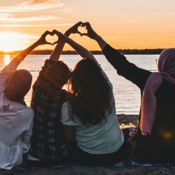 https://unsplash.com/photos/four-people-sitting-on-shore-forming-hearts-with-their-hands-during-golden-hour-MW_2Osq-yIE