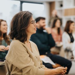 Group of adults attending a training course