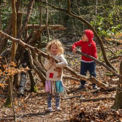 Children with large Sticks, photo taken by Eddie Sherwood