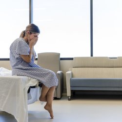woman sitting and listening