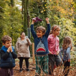 Happy children in woodland