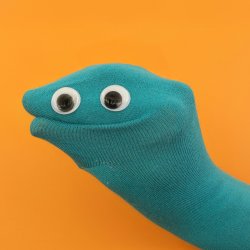 a hand puppet with eyes