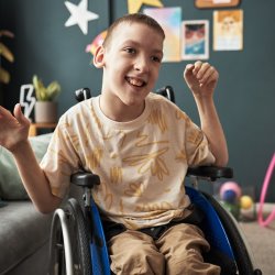Smiling boy in wheelchair