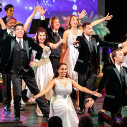 The cast of Holiday Follies on stage