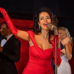 a woman singing cabaret
