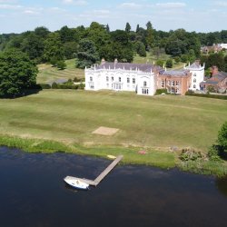 An aerial view of Combermere Abbey and the mere