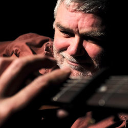 Man playing a guitar