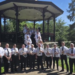 Florence Brass all lined up after performing at Ironbridge
