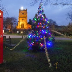 St John's Church Brinklow light up with a Christmas Tree