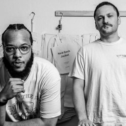 Corey Fonville and Sam Fribush in a tailoring studio