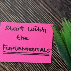 Pink post-it note saying "Start with the Fundamentals"