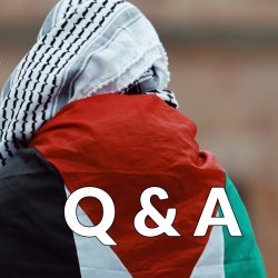 Person facing away from camera, wearing a black and white, Kafiyah draped over their head, and a Palestinian flag around their shoulders. With the letters Q & A written in white.
