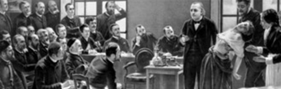 Black and white image of doctors with seizure patient.