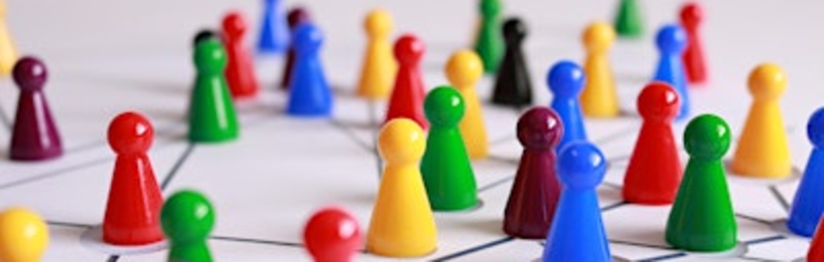 Small plastic cones on a tabletop drawing of a network