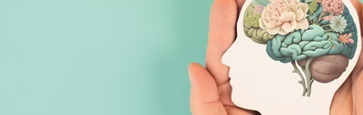 hands holding a pastel coloured brain