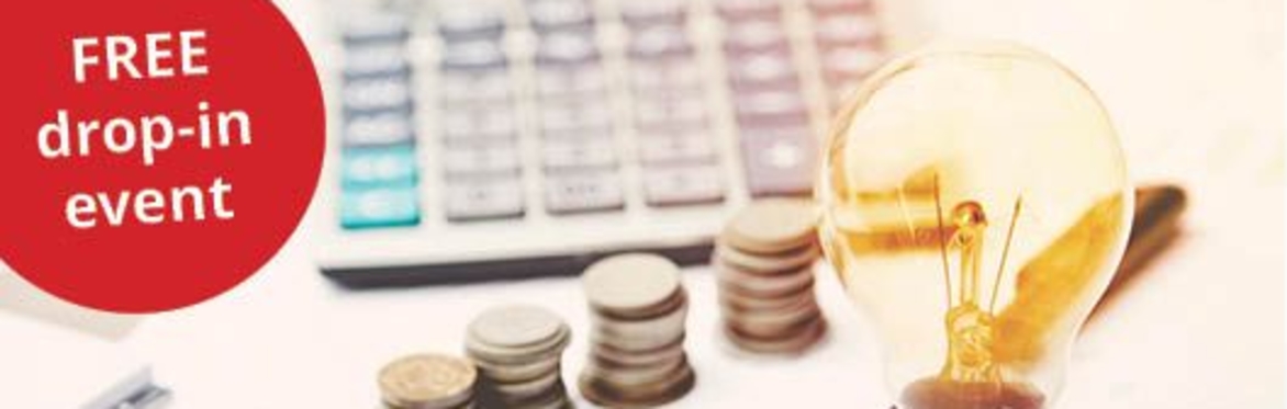 light bulb, coins and calculator