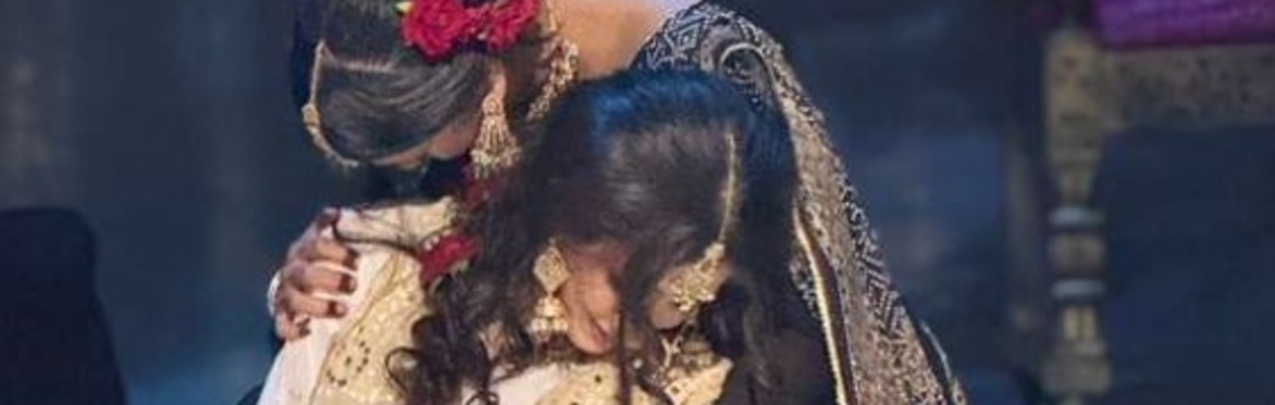 A performer portraying Razia comforts Anarkali, who has just been condemned to be buried alive by the emperor, in a scene from Anarkali Reimagined, produced by Dreamers HTX.