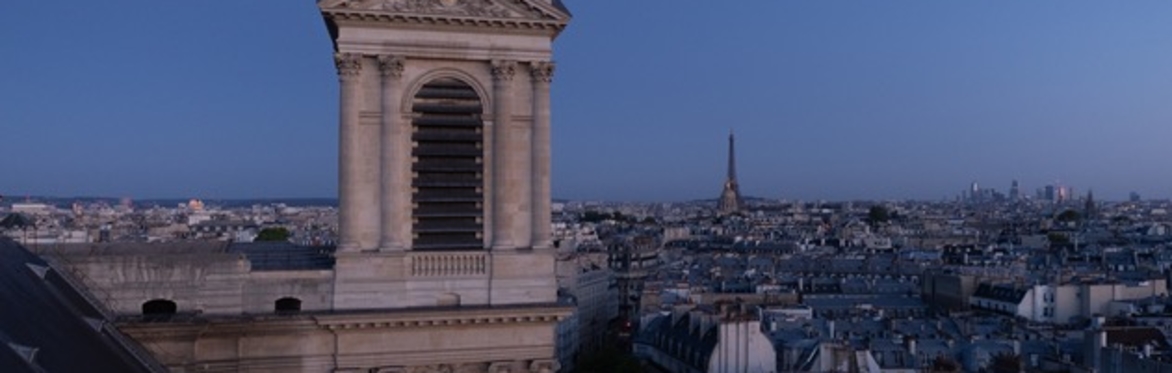 A view across Paris of the church of Saint Sulpice and the Eiffel Tower