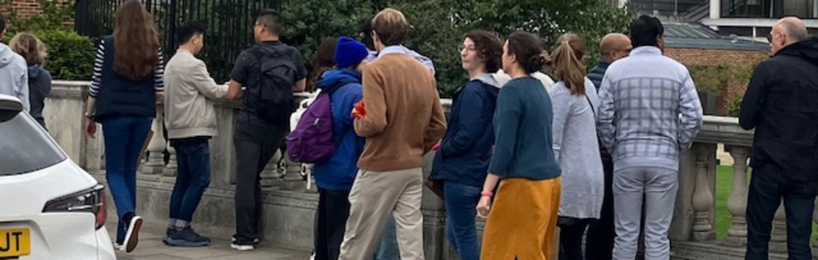 Group of walkers on a bridge