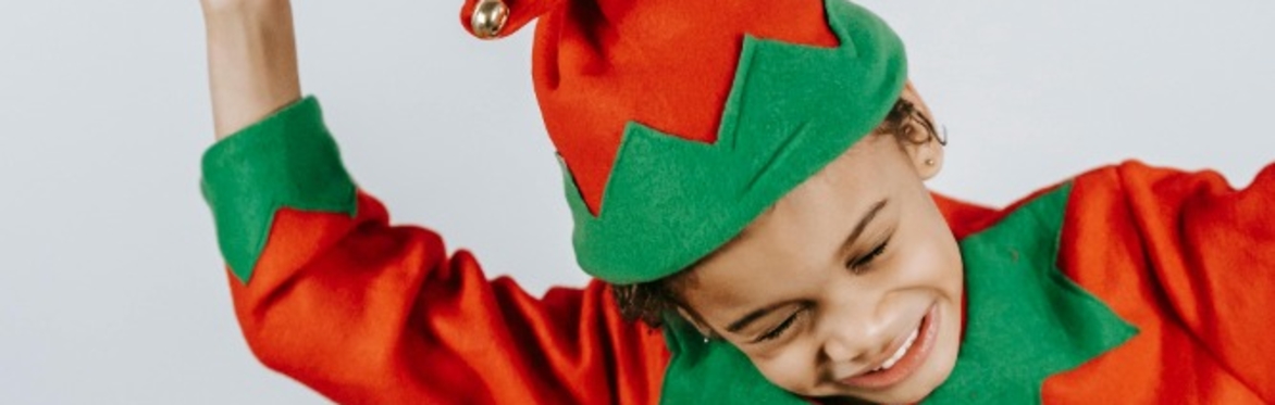 Boy dancing dressed as elf