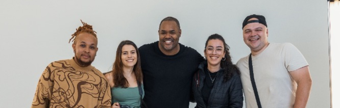 Group of 4 smiling adults