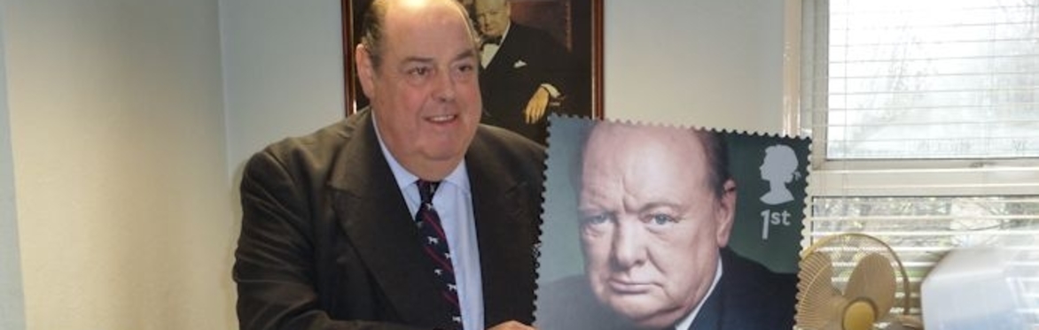 Nicholas Soames holding a stamp of his grandfather, Sir Winston Churchill, to mark the publication of Royal Mail’s souvenir stamp collection of British Prime Ministers. Friday, 5th December, 2014