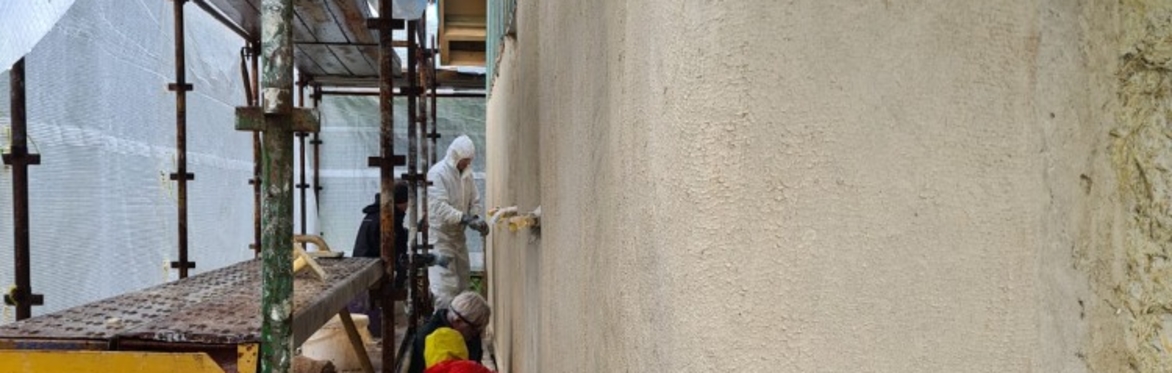 A wall that has been plastered with lime