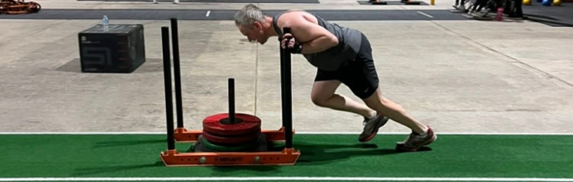 two attendees running a lap