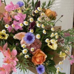 A bouquet of seasonal, summery flowers.