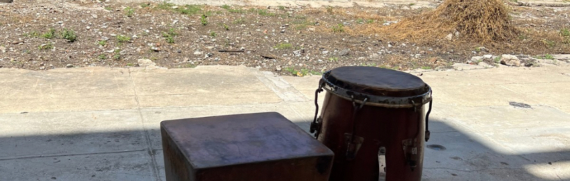 A cajon and tumbadora, for AfroCuban rumba, in a courtyard