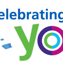 Celebrating you text surround by colourful party streamers
