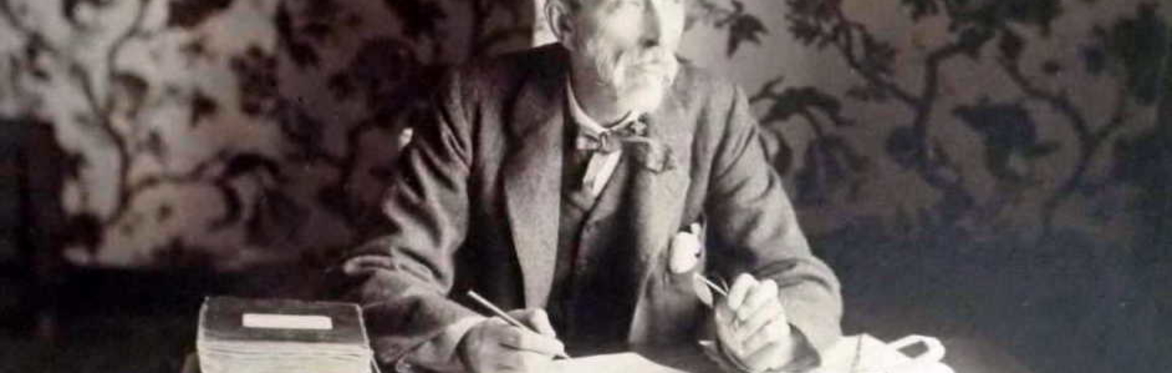 Charles Booth at his desk in Gracedieu Manor