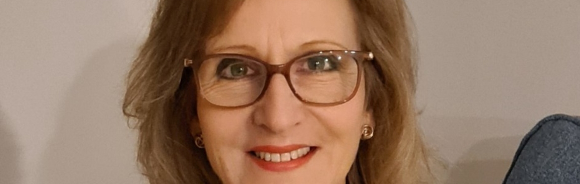 Photo of woman with confident smile