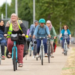 Two people cycling