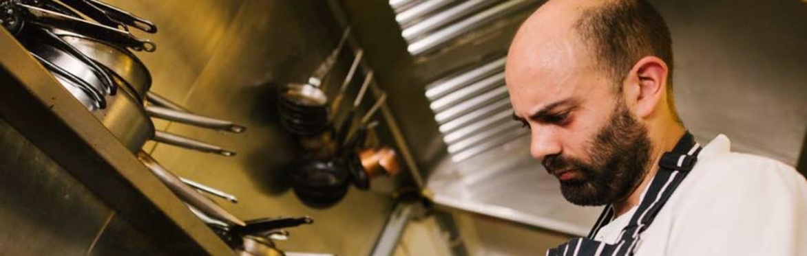 Photo of chef Lee Rushforth cooking at a hob
